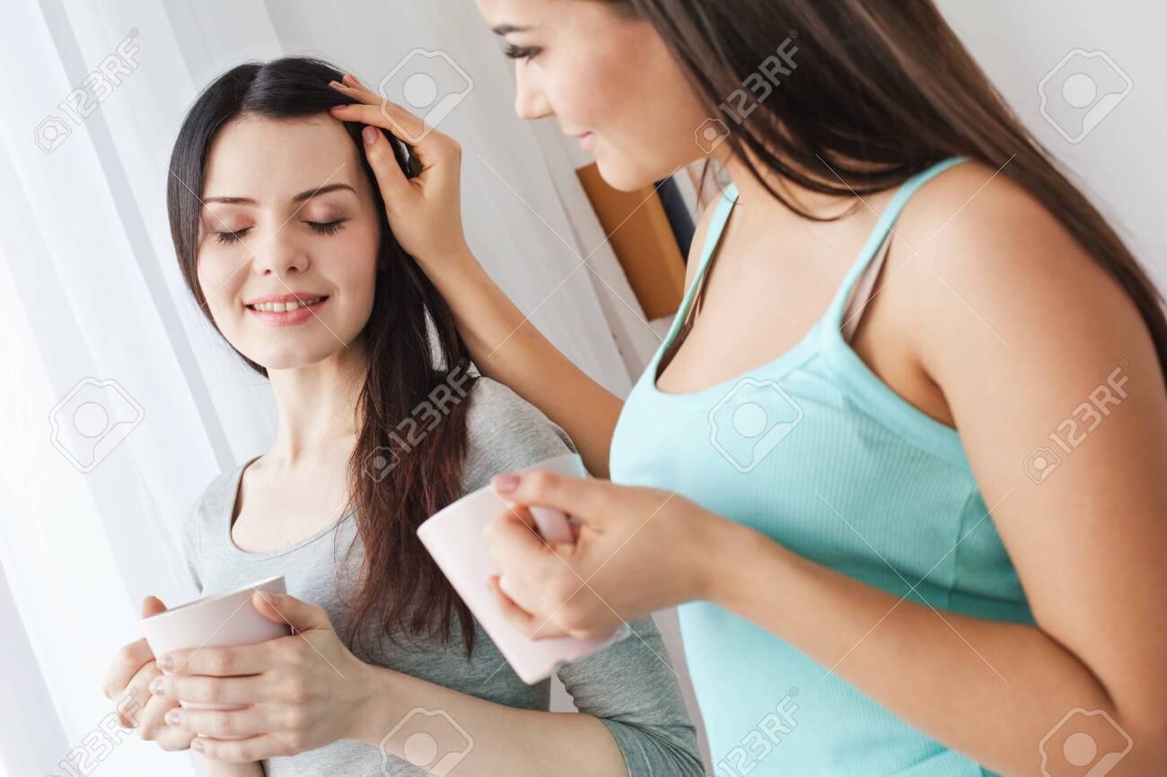 Cups Of Hot Tea One Woman Touching Hair