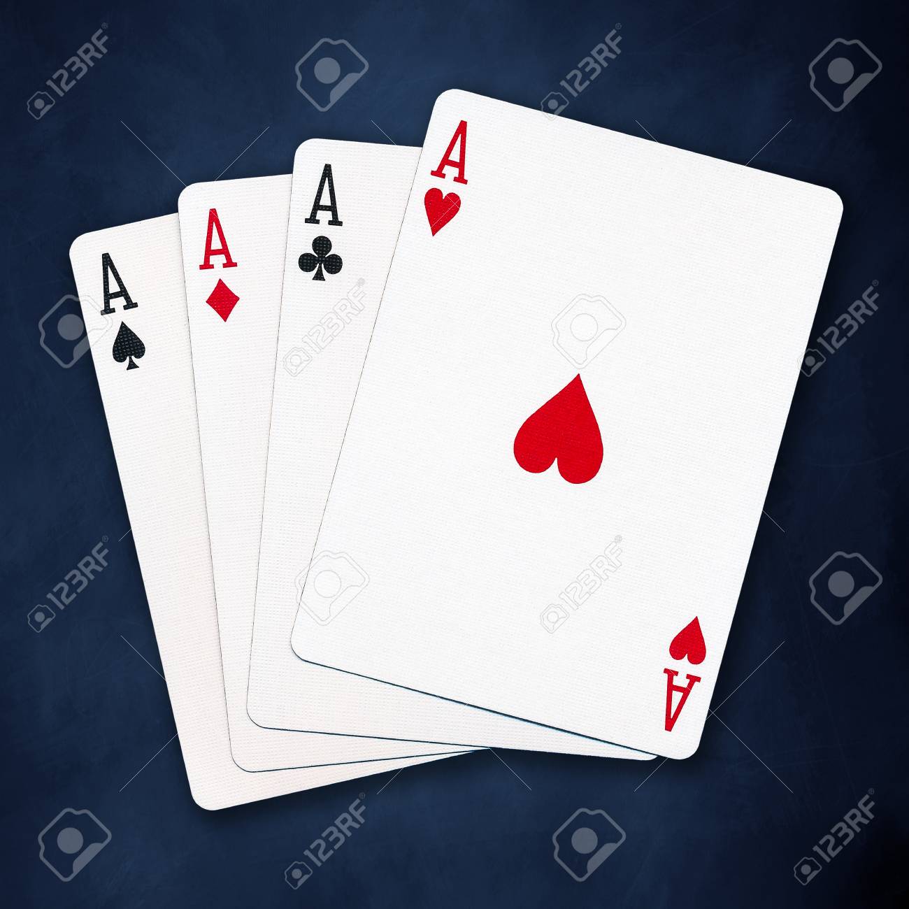 A Winning Poker Hand Of Four Aces Playing Cards Suits On Blue Stock Photo Picture And Royalty Free Image Image