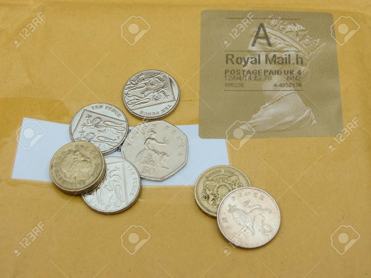 2014 年 4 月頃、ロンドン: 英国ポンド硬貨 (イギリスの通貨) 役に立つ