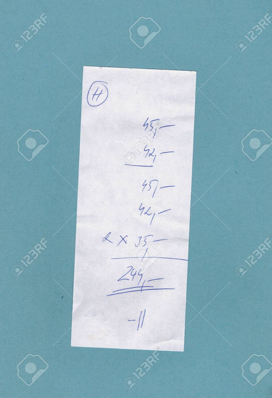 handwritten bill or receipt isolated over blue background stock handwritten receipt