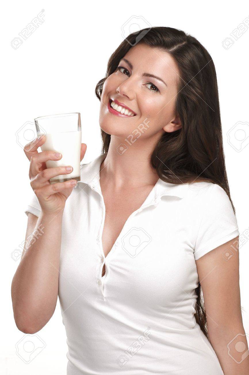 young beautiful woman drink a glass of milk on white - 20888526 young beautiful woman drink a glass of milk on white - 20888526