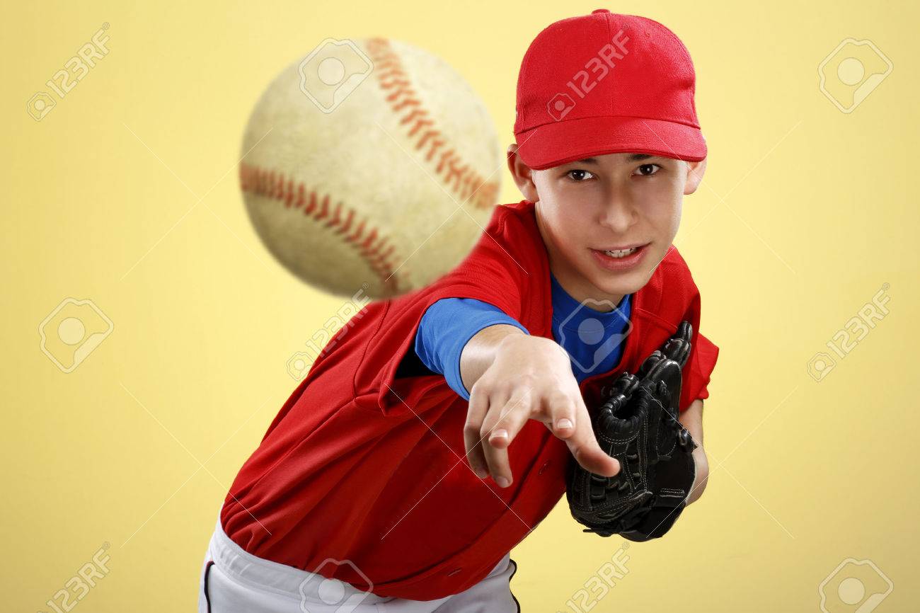 portrait of a beautiful teen baseball player in red and white uniform on colorful background - 26906549 portrait of a beautiful teen baseball player in red and white uniform on colorful background - 26906549