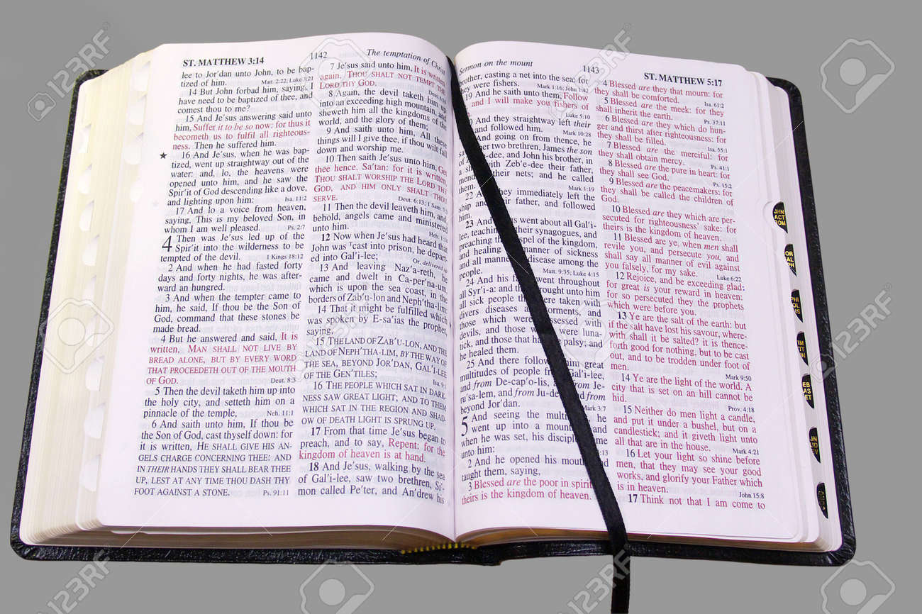 bible kjv opened to the gospel of matthew with stock photo