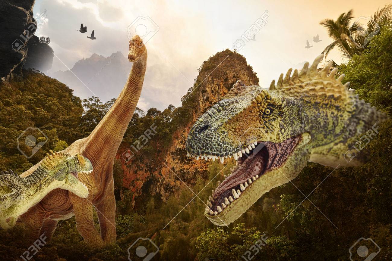 dinosaur fight scene of the two dinosaurs fighting each stock photo