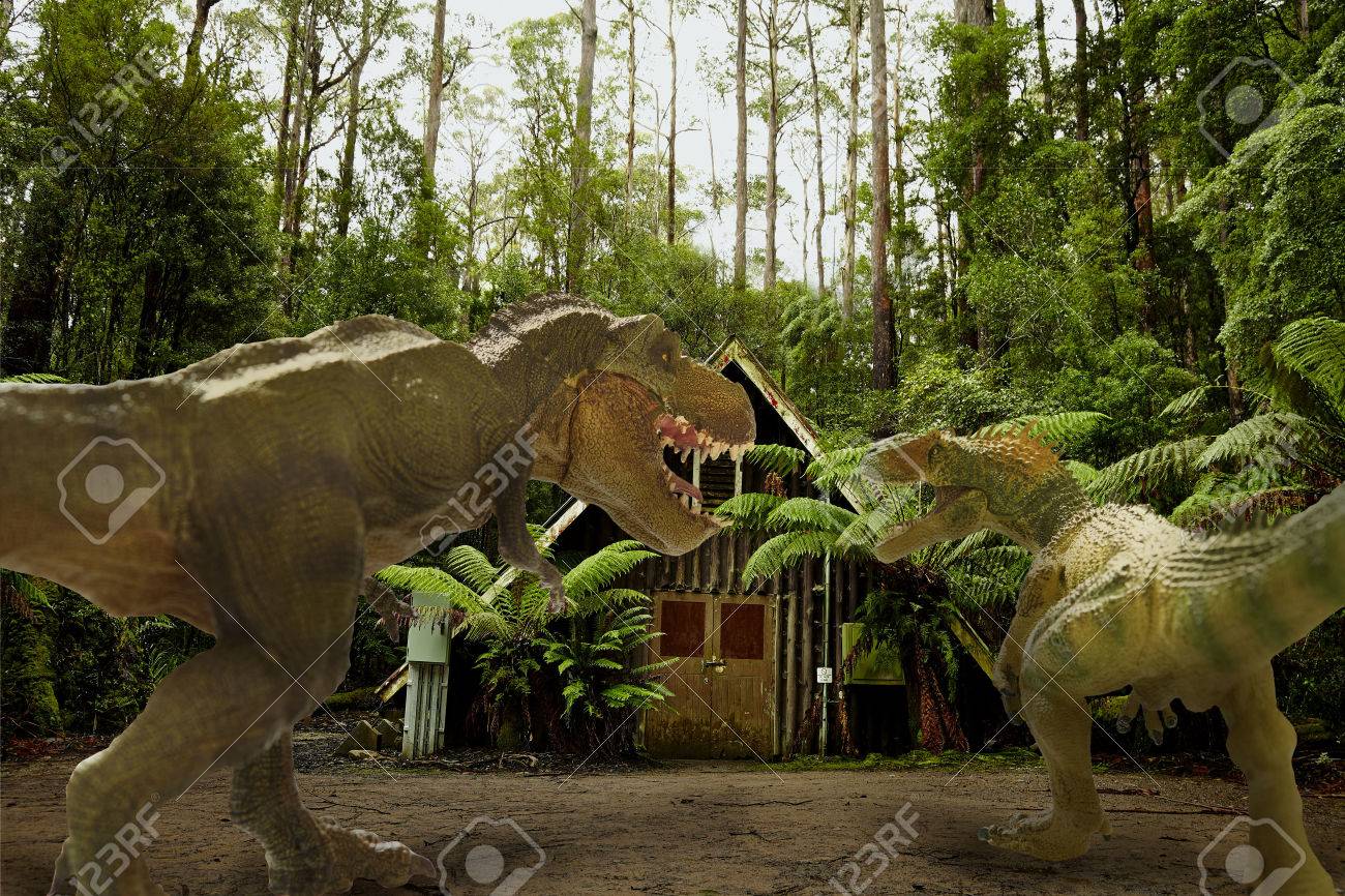 dinosaur fight scene of the two dinosaurs fighting each stock photo