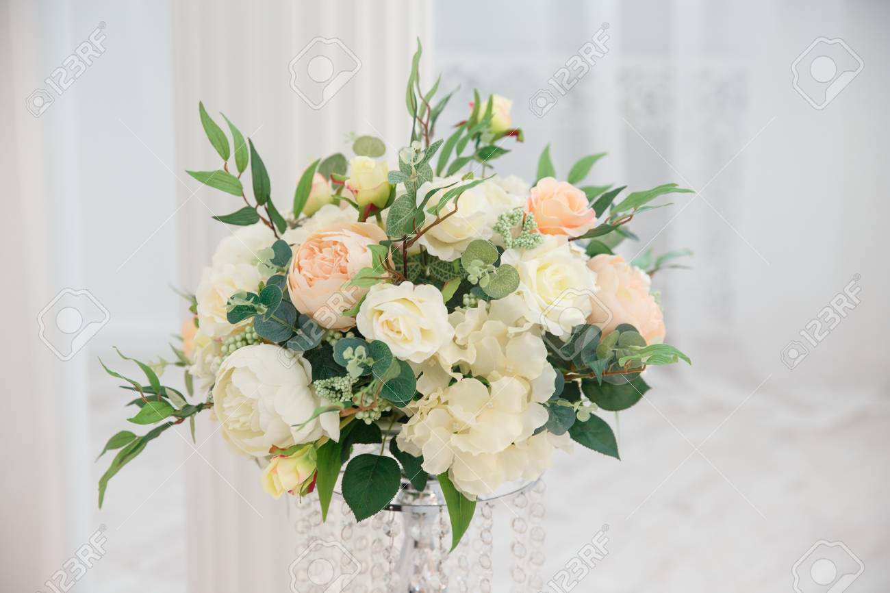 Artificial Flowers Vase With A Flower Arrangement In An Expensive