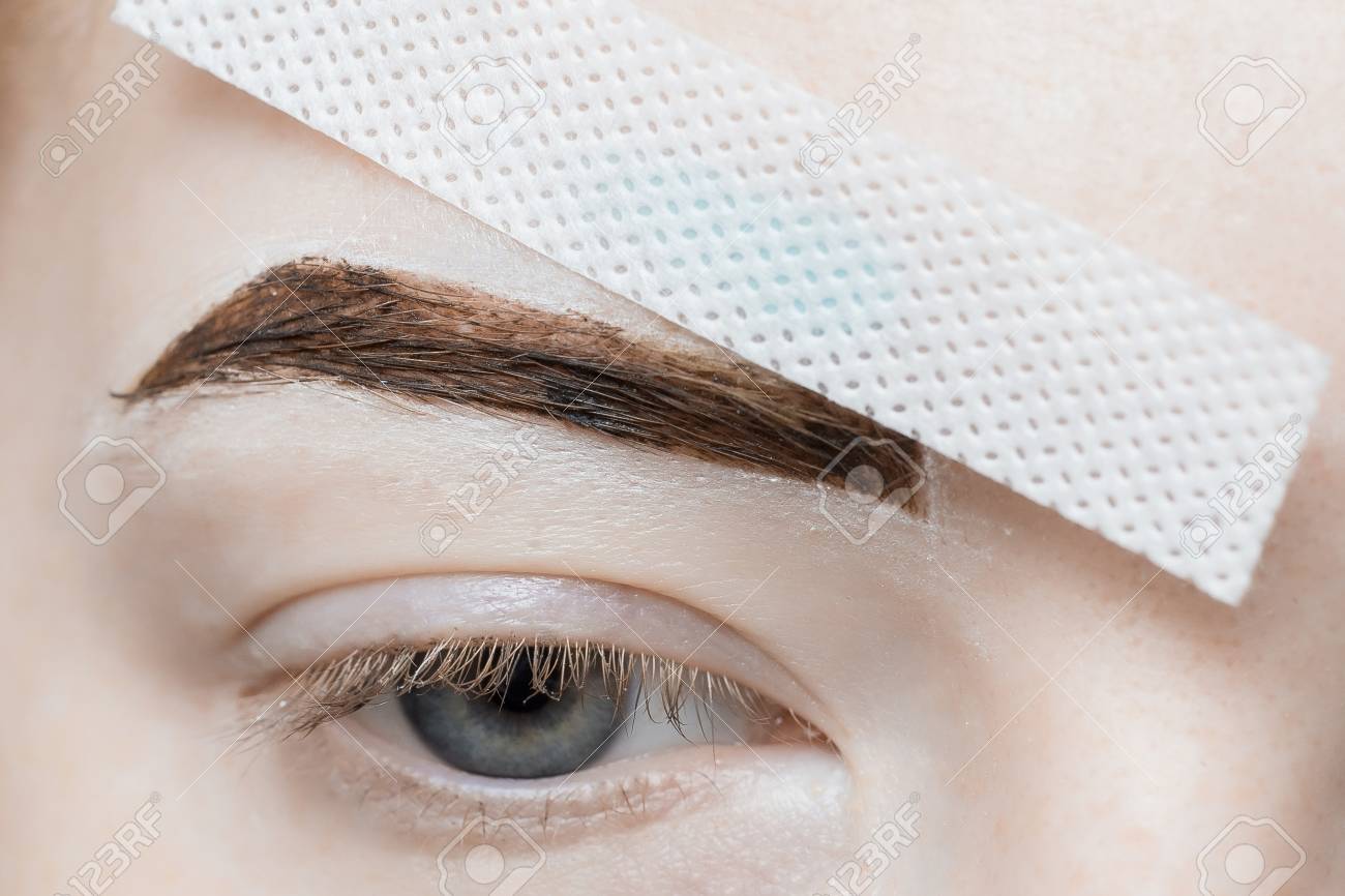 Hair Removal Of Eyebrows With Help Of Melted Wax In Beauty Salon
