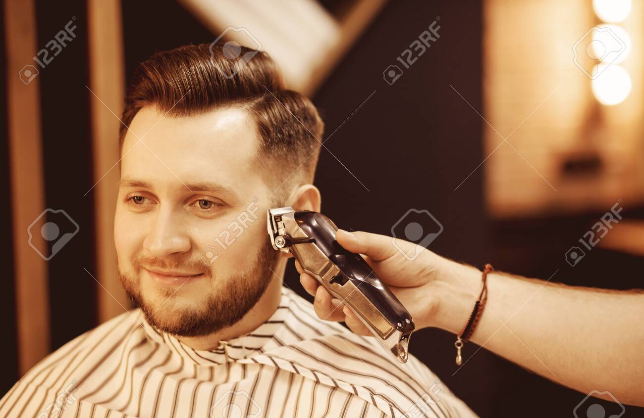 Hipster With Fashionable Haircut Beard Trim Temples Barbershop