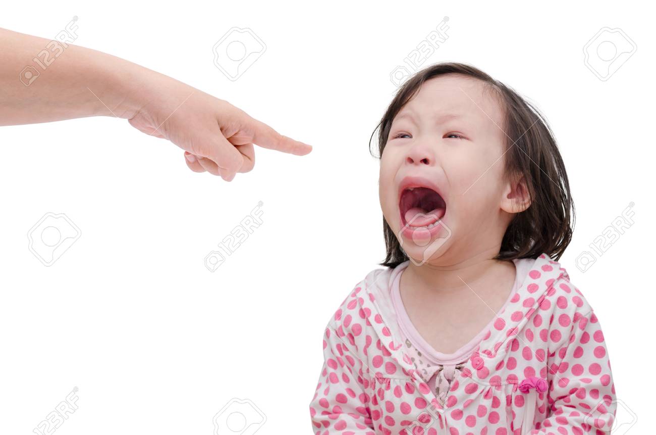 Asian baby crying while mother scolding on white background - 53135577 Asian baby crying while mother scolding on white background - 53135577