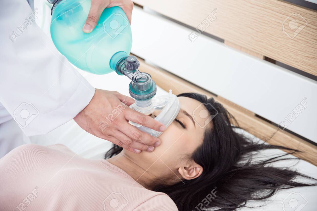 Doctor Hands Holding Resuscitation Bag Medical Team Helping A Woman Who Are Not Breathing With Ambu Bag In Cpr Cardiopulmonary Resuscitation Process Stock Photo Picture And Royalty Free Image Image 144212775