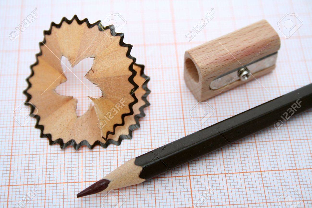 wooden sharpener shaving and pencil for plotting on a millimetric