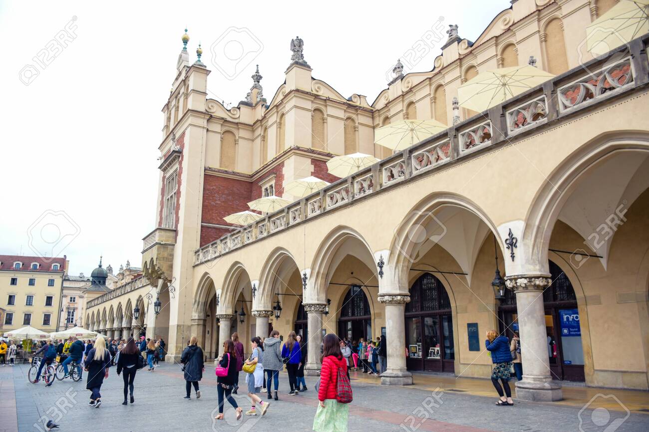 Tourists Enjoying Their Time At Krakow Cloth Hall The Central Feature Of Main Market Square In The Krakow Old Town Poland Stock Photo Picture And Royalty Free Image Image 133075036