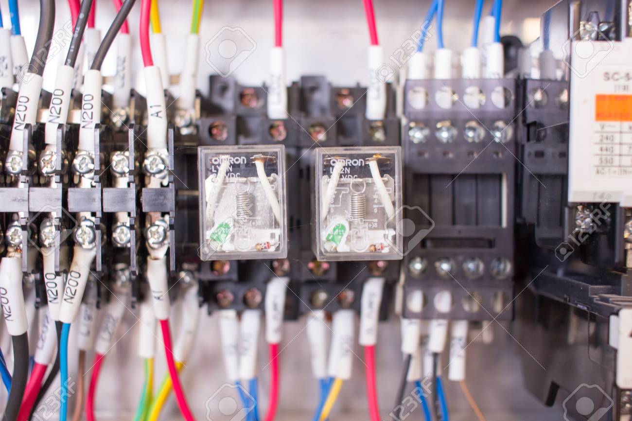 Stock Photo - Wiring PLC Control panel with wires industrial factory