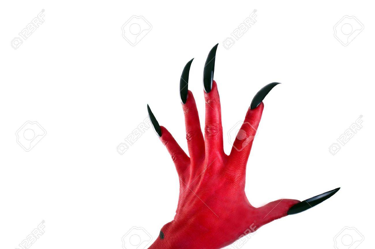 a red devil hand with black nails stock photo picture and royalty