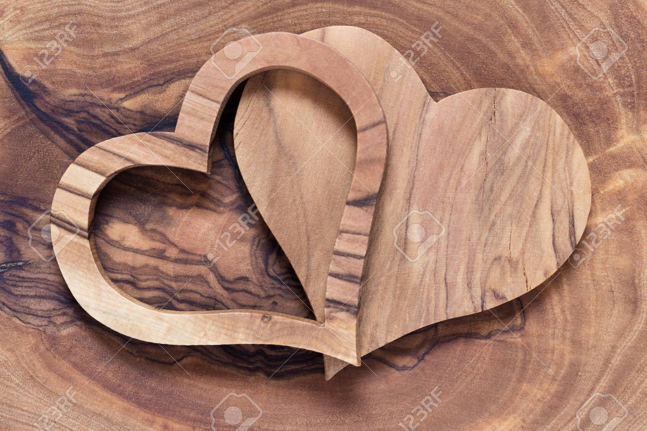 51167571-two-wooden-hearts-on-a-wooden-background-olive-wood-copyspace-horicontal-concept-wedding.jpg