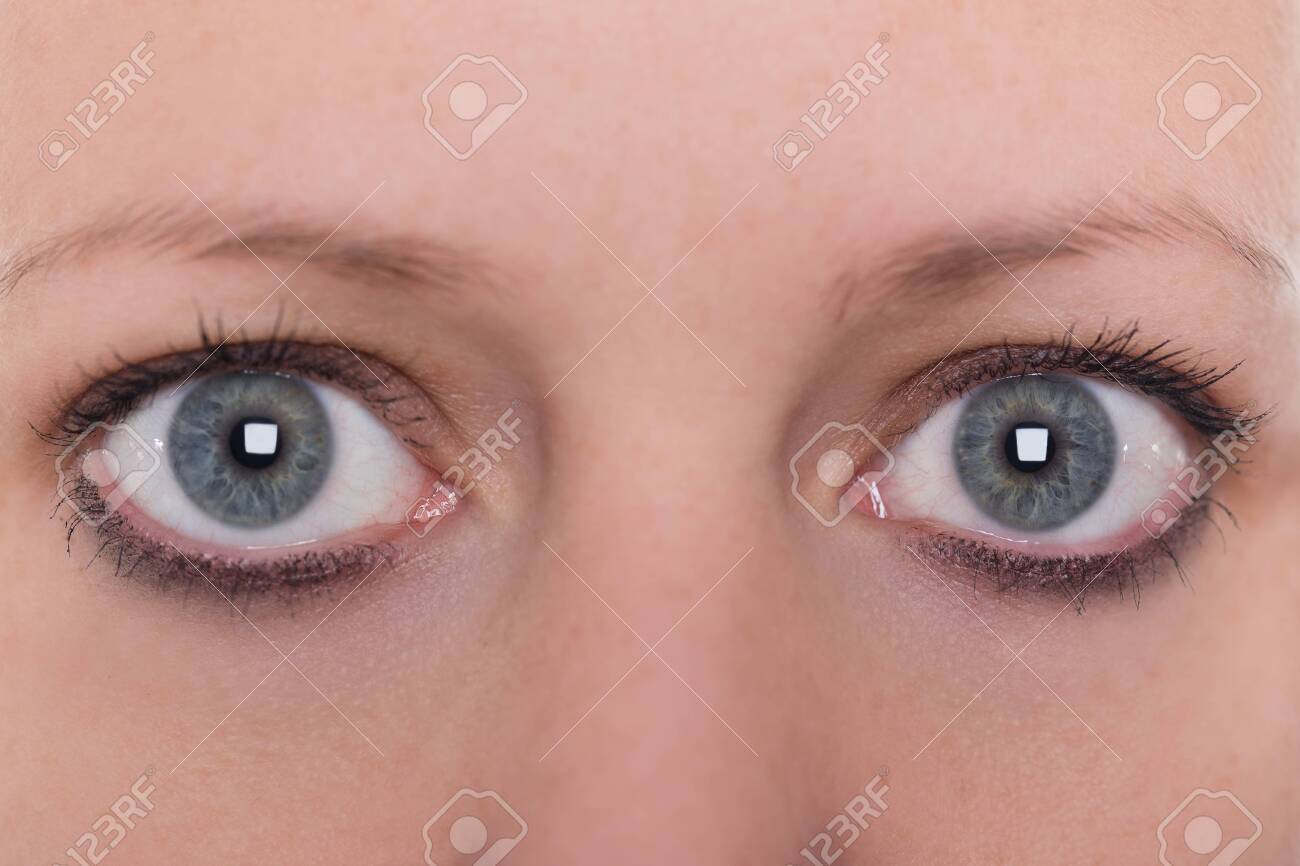close up, blue eyes and eyebrows from a young woman - 122166910 close up, blue eyes and eyebrows from a young woman - 122166910