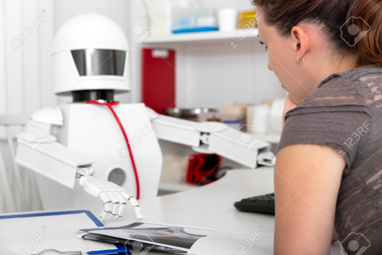 female patient is consulting a ai medicine robot in his office, concept lack of professionals - 170379734 female patient is consulting a ai medicine robot in his office, concept lack of professionals - 170379734