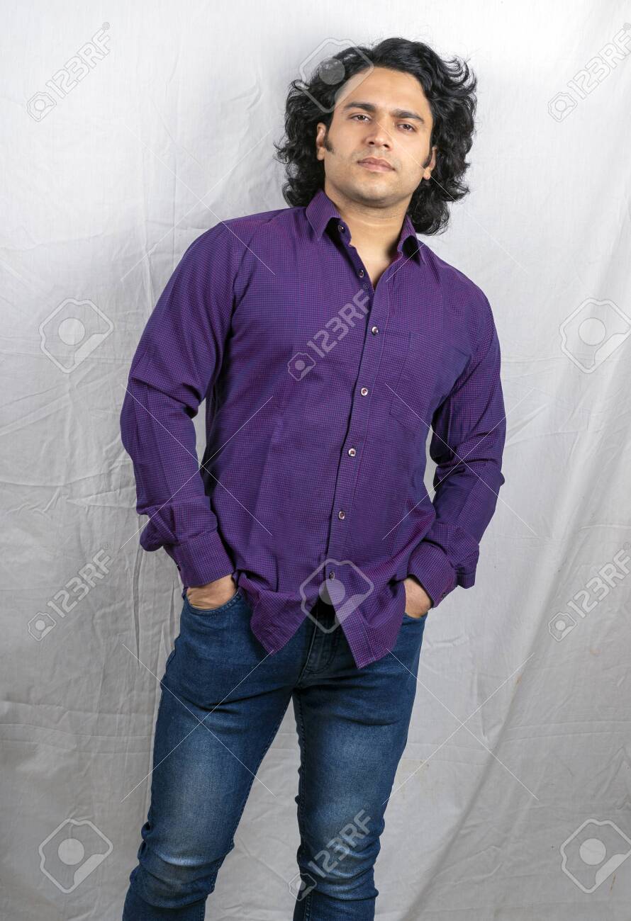 black jeans purple shirt