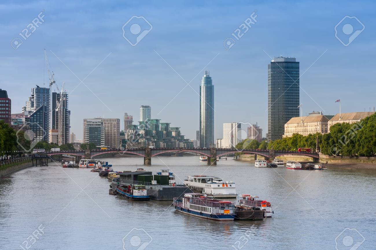 City cruise ships on the river Thames, on background Lambert Bridge and London Towers in the morning, London, England. - 90085684 City cruise ships on the river Thames, on background Lambert Bridge and London Towers in the morning, London, England. - 90085684