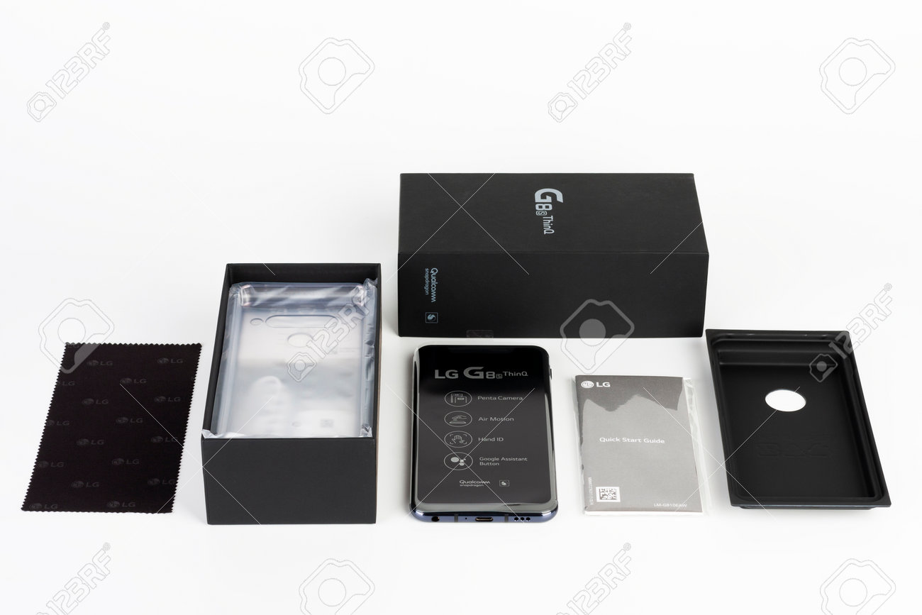 Brnenec, Czech Republic - January 20, 2020: Unboxing of touchscreen smartphone LG G8S ThinQ, paper box, silicone cover, charger, clean cloth. LG is a South Korean multinational electronics company. - 162225016 Brnenec, Czech Republic - January 20, 2020: Unboxing of touchscreen smartphone LG G8S ThinQ, paper box, silicone cover, charger, clean cloth. LG is a South Korean multinational electronics company. - 162225016