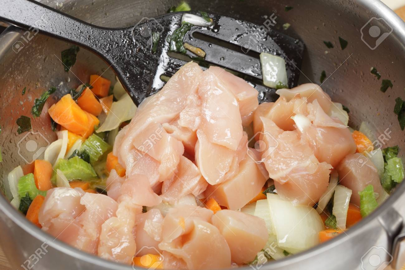 Adding Diced Chicken Breasts To A Risotto Base Of Onion Carrot Stock Photo Picture And Royalty Free Image Image 17478655
