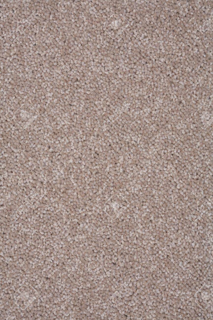 Closeup of a twist pile carpet in natural brown color Closeup of a twist pile carpet in natural brown color