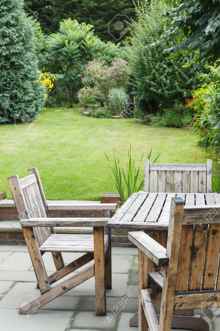 Wooden Garden Furniture Table And Chairs On A Patio