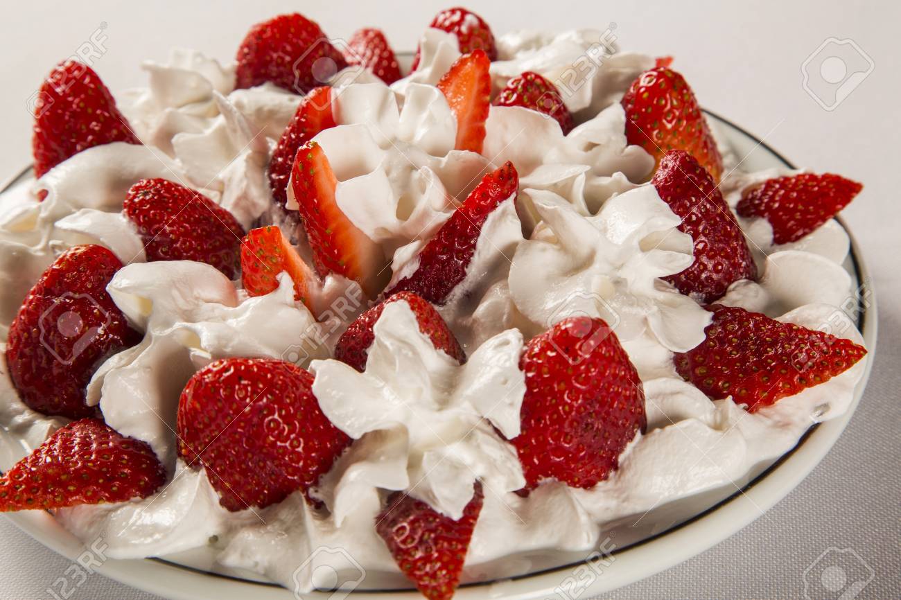 Strawberry With Chantilly Cream In A Dish On A Wooden Table Stock Photo Picture And Royalty Free Image Image