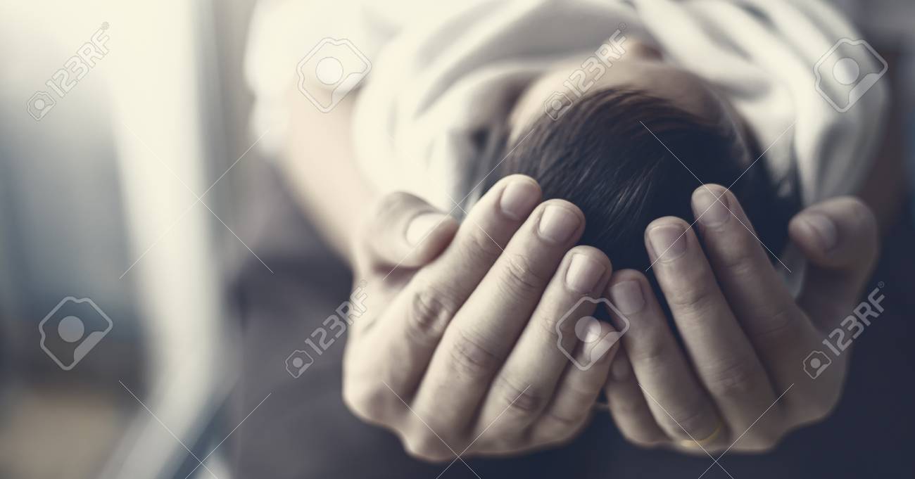 close up father hands holding newborn baby copy space background