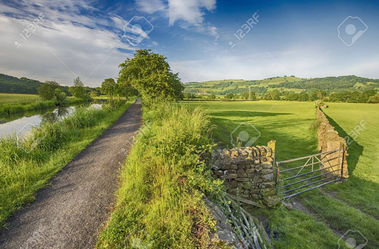 Landscape View Of English Rural Countryside Scenery On British Waterway  Canal During Cloudy Day Stock Photo, Picture and Royalty Free Image. Image  128069232., image size:1300x856