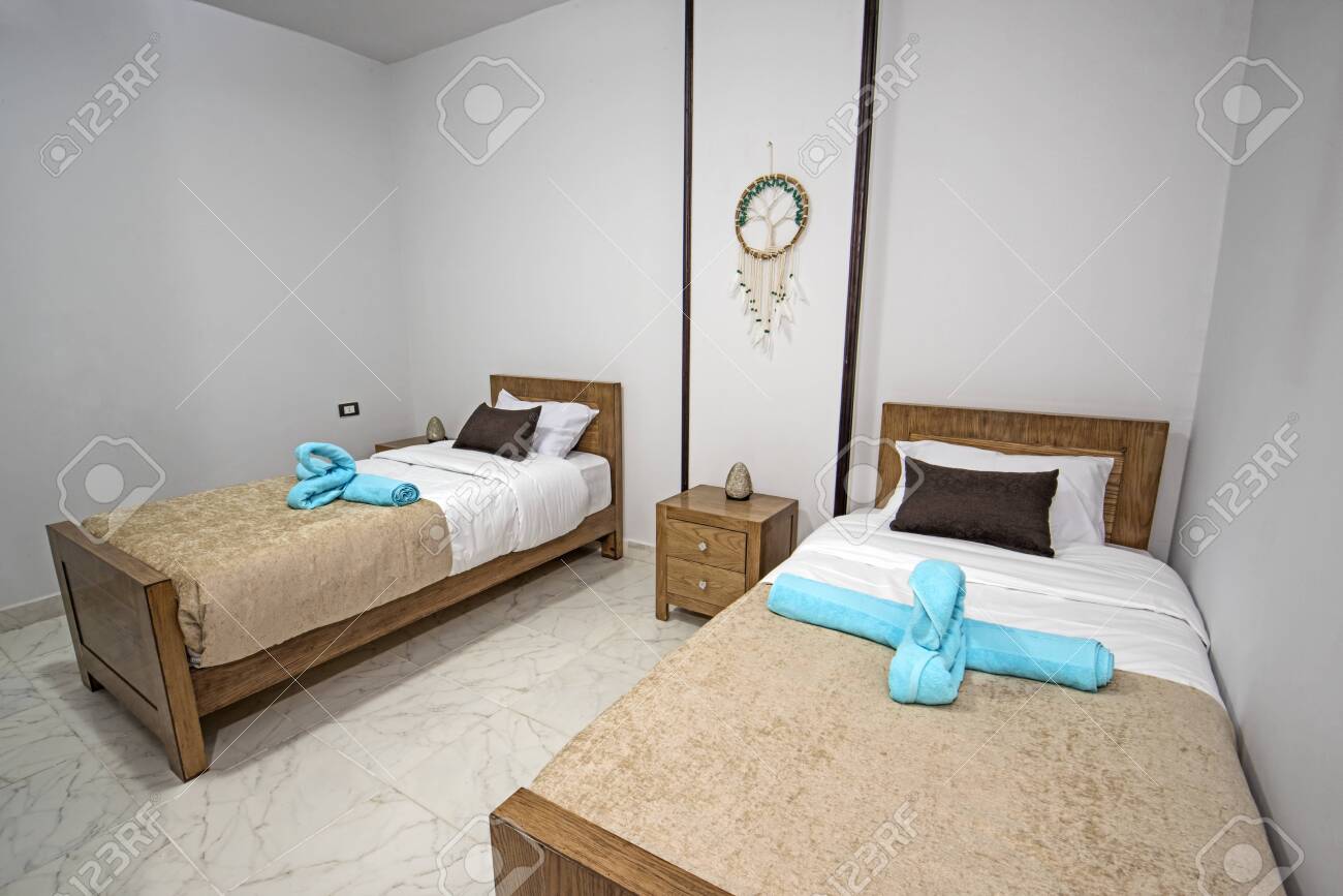 Interior Design Decor Furnishing Of Luxury Apartment Bedroom With Twin Single Beds Stock Photo Picture And Royalty Free Image Image