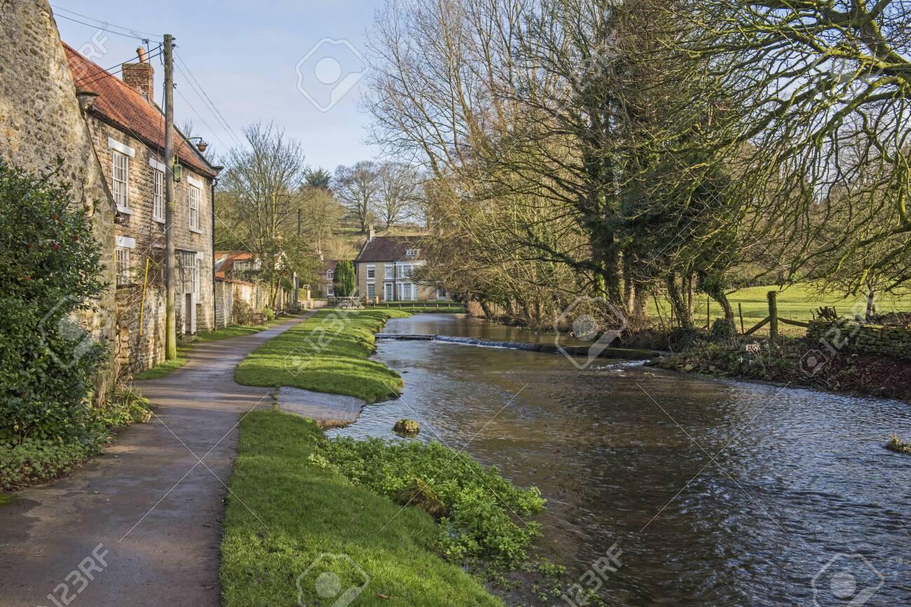 Landscape View Of A Rural English Countryside Village Scene With  Traditional Cottages And A Stream Stock Photo, Picture and Royalty Free  Image. Image 141678642., image size:1300x867