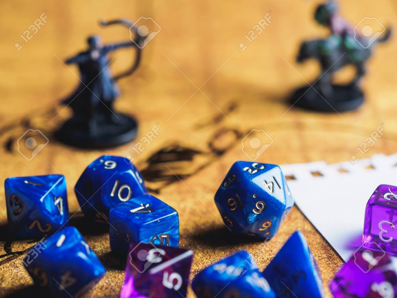 roleplay game with dragons in dungeon yellow field dice stock