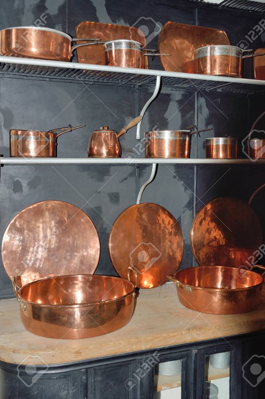 Vintage Copper Pots In Portrait Aspect 