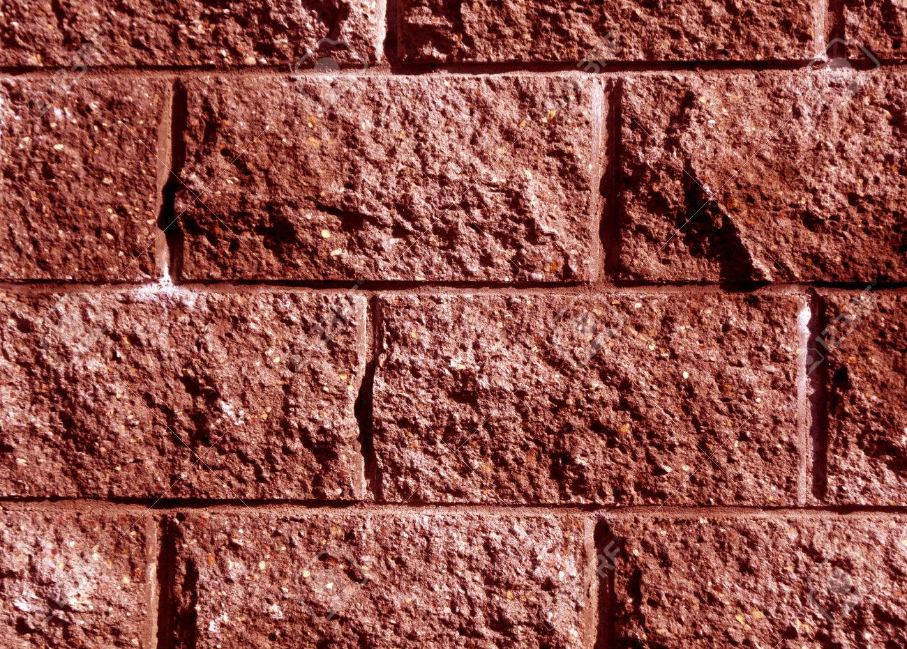 赤い色は、レンガ壁のパターンを様式化されました。抽象的な背景とデザインのためのテクスチャ。 の写真素材・画像素材 Image 76437149.