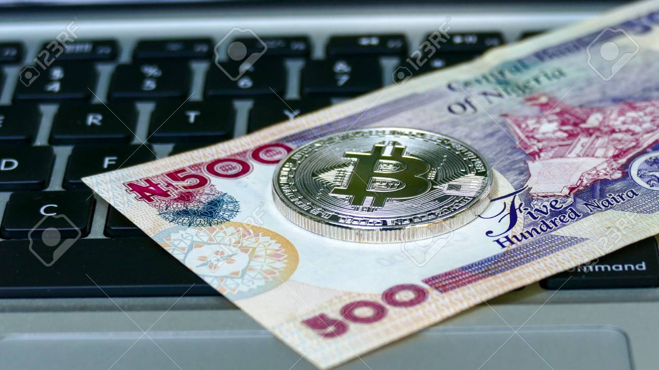 Bitcoin On Nigerian Naira Banknote. Electronic Money Exchange Concept Stock  Photo, Picture and Royalty Free Image. Image 83974128.