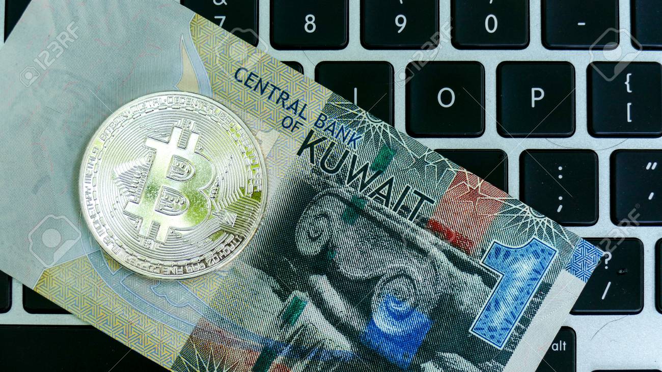 Bitcoin On Kuwait Dinar Banknote. Electronic Money Exchange Concept. Stock  Photo, Picture and Royalty Free Image. Image 83974126.