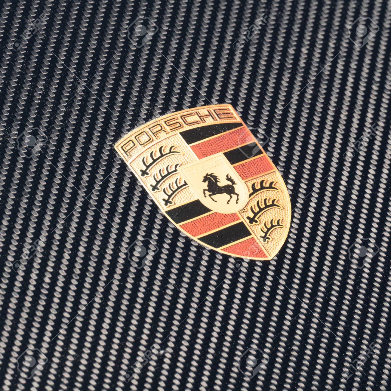 Porsche logo on carbon cars hood. Close up view. SEP 26, 2018..