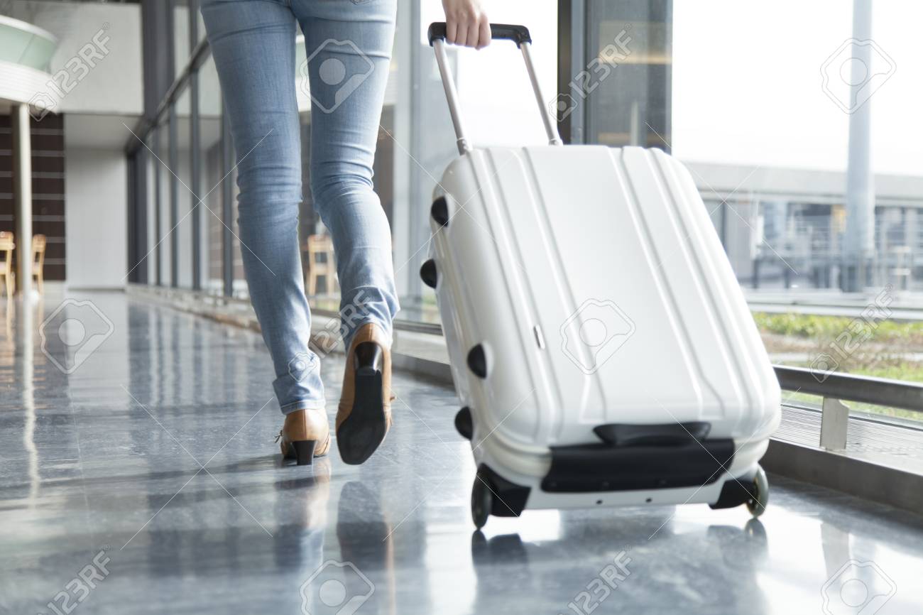 From behind the woman walking by subtracting the suitcase - 51459209 From behind the woman walking by subtracting the suitcase - 51459209