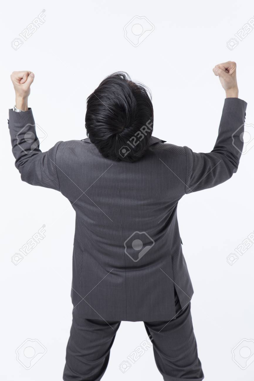 後ろ ガッツポーズするビジネスマンから の写真素材 画像素材 Image
