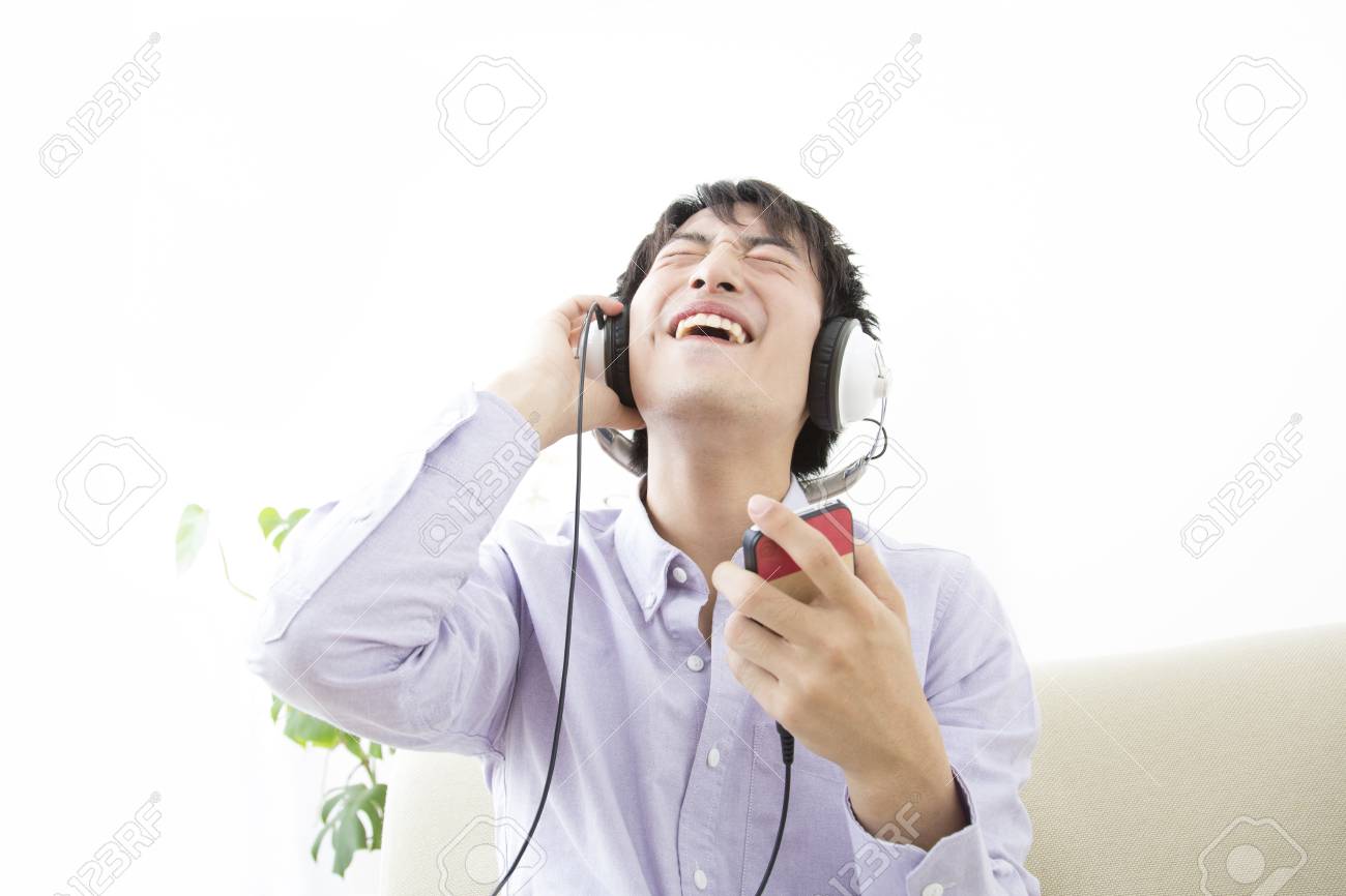 Men Who Listen To Music With Headphones Stock Photo Picture And Royalty Free Image Image