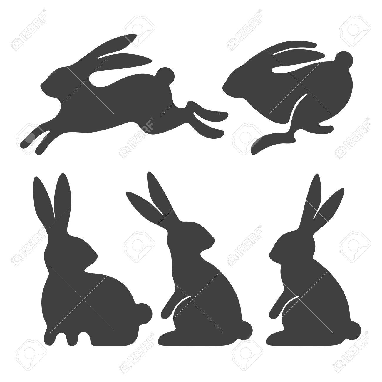 Stylized silhouettes of sitting and running rabbits - 85124086 Stylized silhouettes of sitting and running rabbits - 85124086