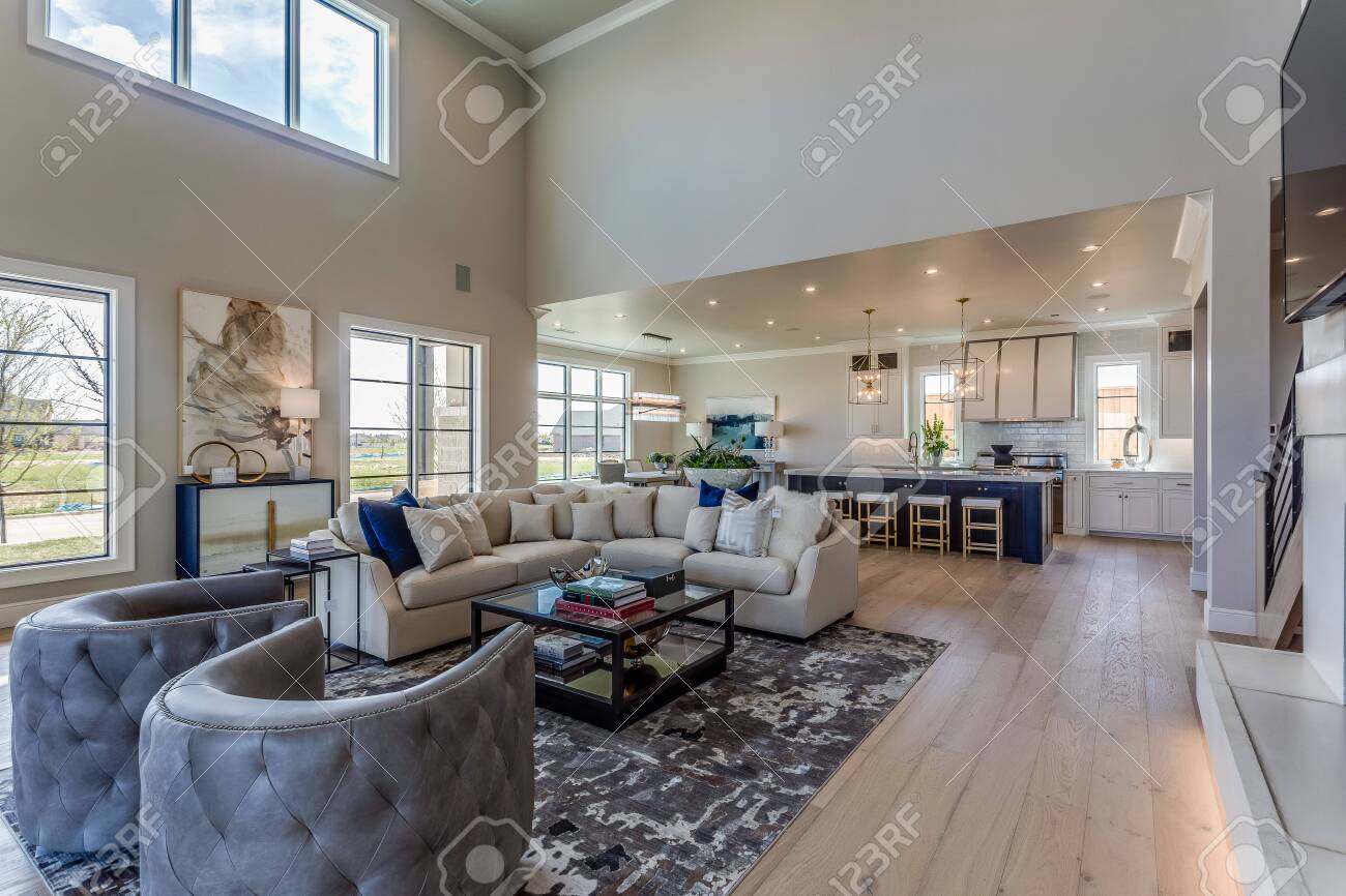 Great Family Room Of Open Floorplan Home With High Ceiling Stock Photo,  Picture and Royalty Free Image. Image 146846852., image size:1300x866