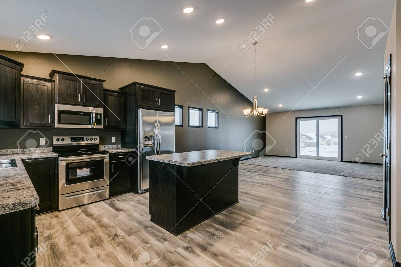 Front Door Opens Right Next To Kitchen With Open Layout Stock Photo,  Picture and Royalty Free Image. Image 147491585., image size:1300x866