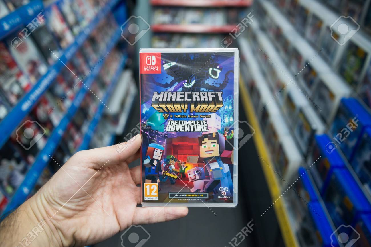 Nintendo switch games minecraft story mode,bratislava slovakia december 2 2017 man holding minecraft stock photo picture and royalty free image image 91065637