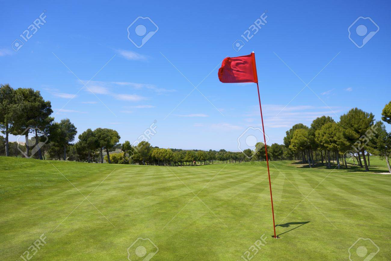 view of a golf course with a red pennant - 19362617 view of a golf course with a red pennant - 19362617