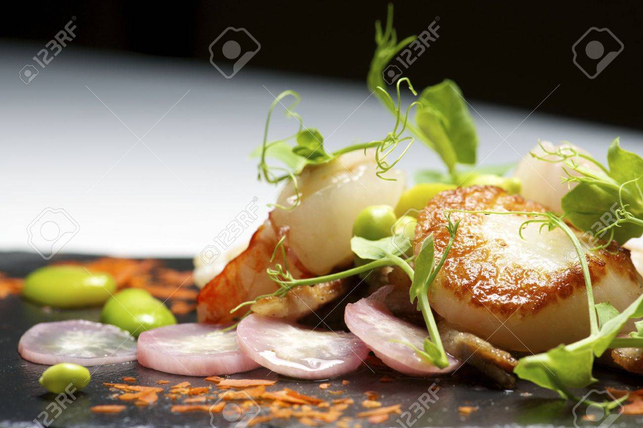 Piglet sauteed with scallops and prawns. - 41094520 Piglet sauteed with scallops and prawns. - 41094520