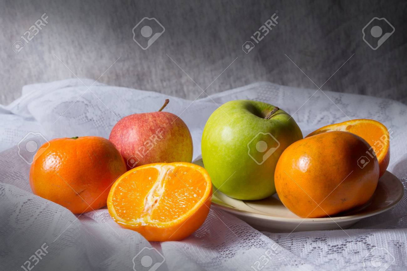 Still Life Combination Fruits Green And Red Apple With Orange Stock Photo Picture And Royalty Free Image Image