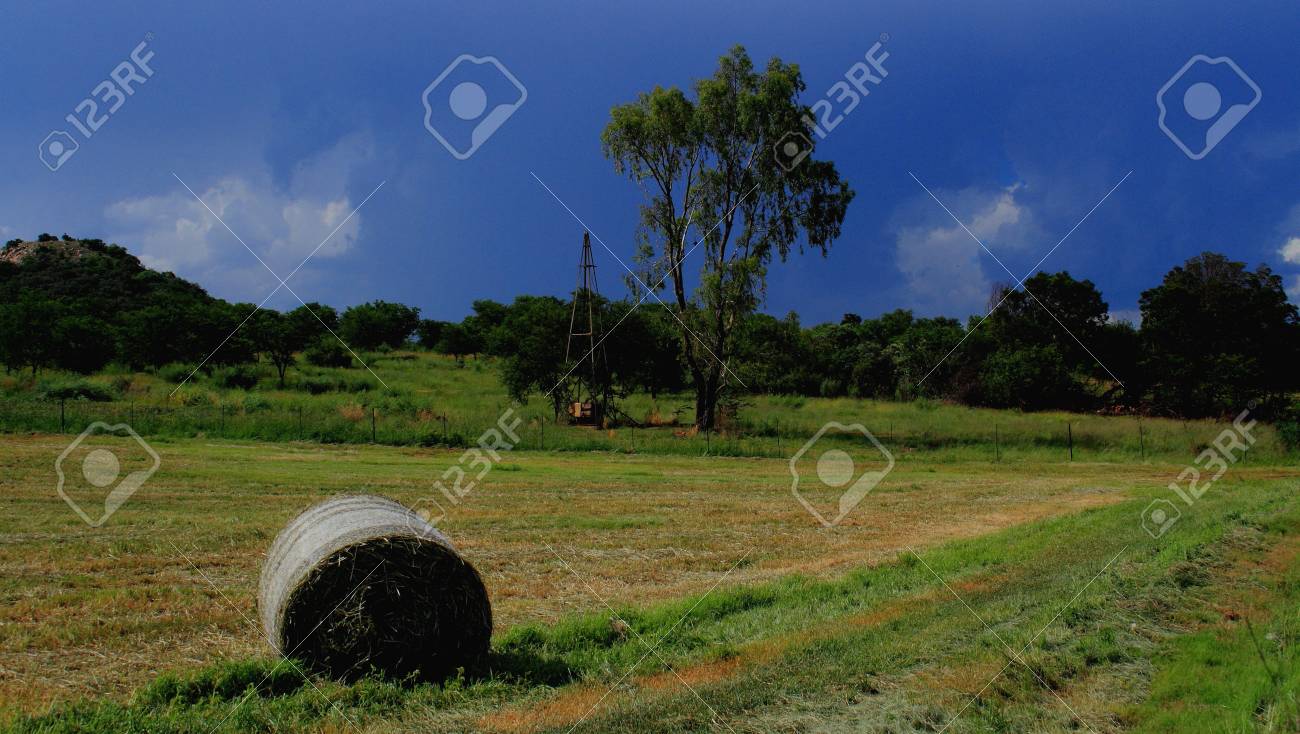 Make Hay While The Sun Shines Hay Bales In A Farm Field Stock Photo Picture And Royalty Free Image Image 34909287
