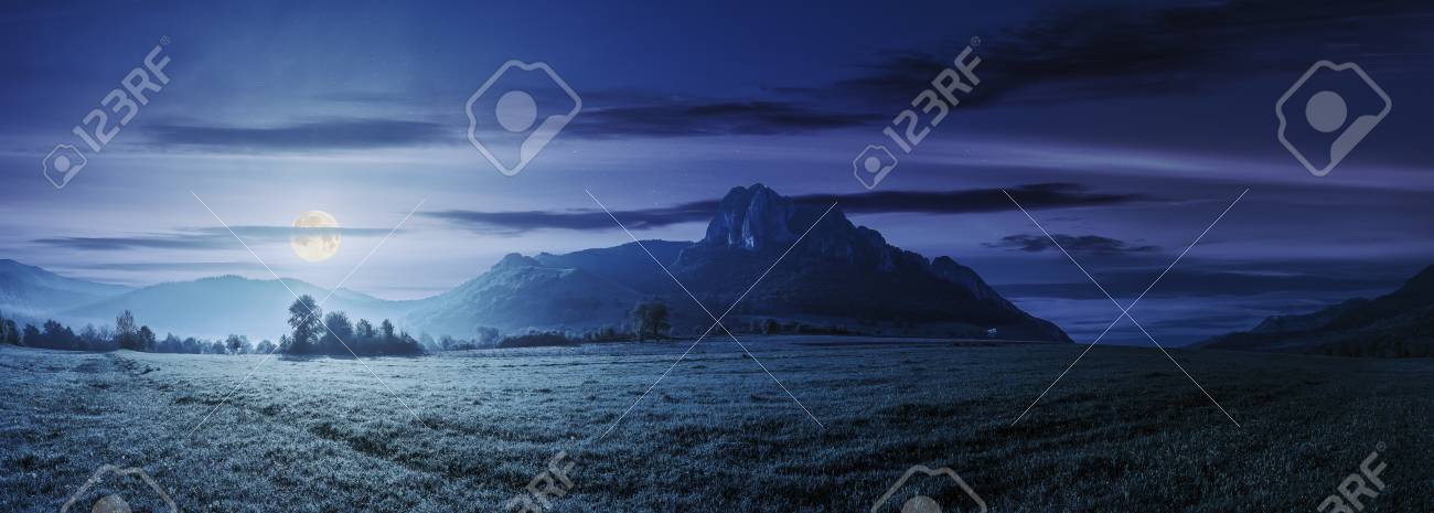 Panorama Of Romania Countryside At Night In Full Moon Light Beautiful Scenery With Trees In Haze